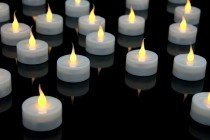 8 Elektrische Teelichter in Windgläsern