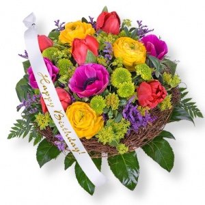 Blütenpracht und Schleife: Happy Birthda