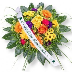 Blütenpracht und Schleife: Herzlichen Gl