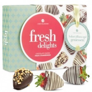 Erdbeeren in drei Schokoladensorten