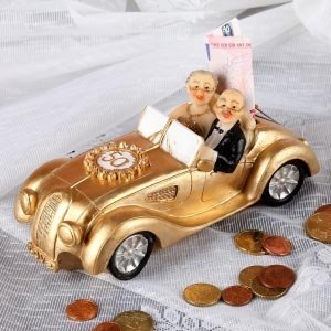 Goldener Oldtimer als Spardose zur Goldh