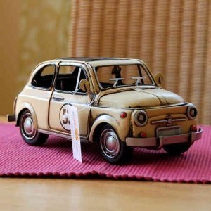 Model 1957 cream fiat, Clayre & Eef