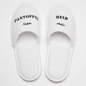 PANTOFFELHELDEN Reise-Slipper Text: PANT
