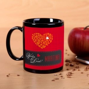Schwarze Tasse *Vielen Dank* mit Herz un