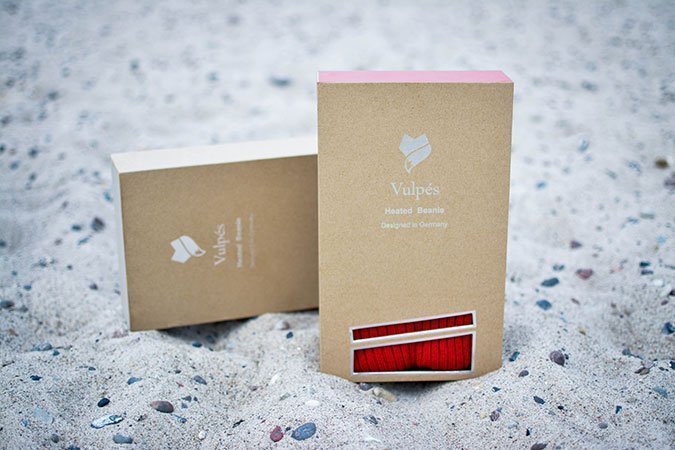 Der Vulpés – Smart Heated Beanie Hat in seiner Verpackung.